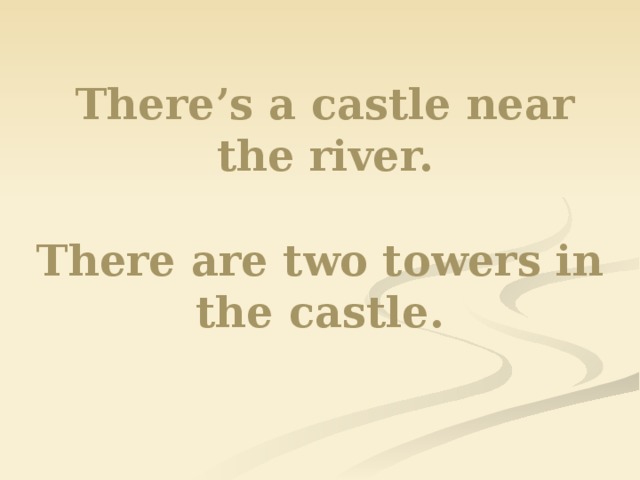 There’s a castle near the river. There are two towers in the castle.  