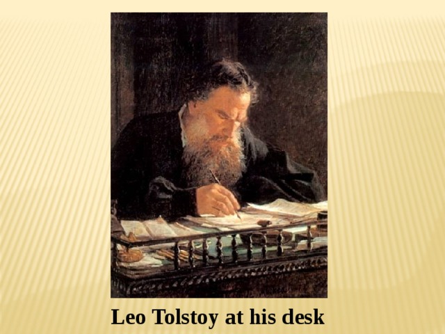 Leo Tolstoy at his desk 