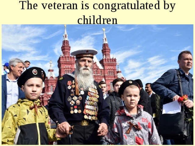 The veteran is congratulated by children 