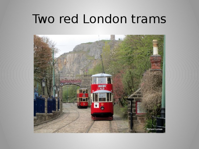 Two red London trams 