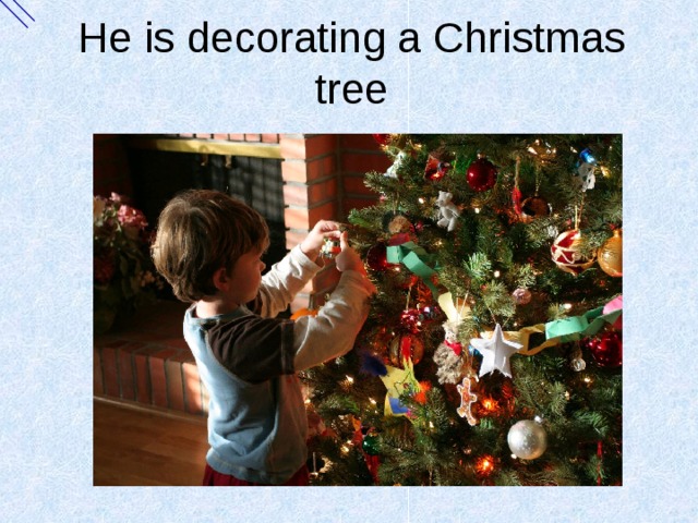 He is decorating a Christmas tree 