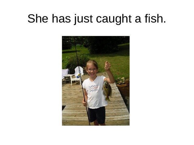 She has just caught a fish. 