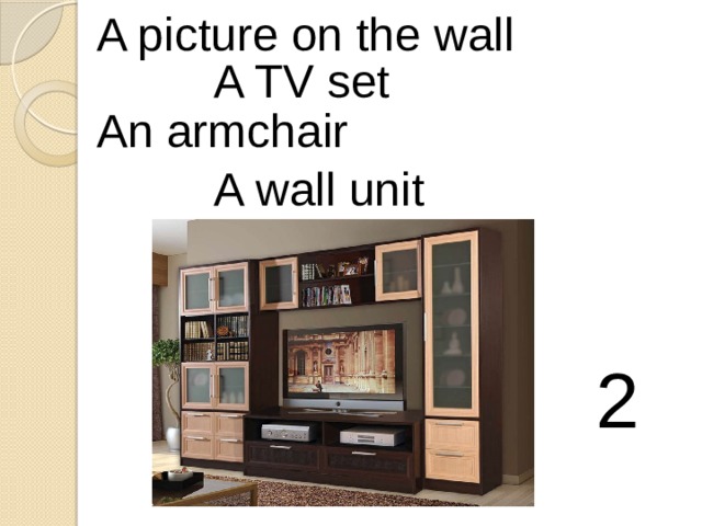 A picture on the wall A TV set An armchair A wall unit 2 