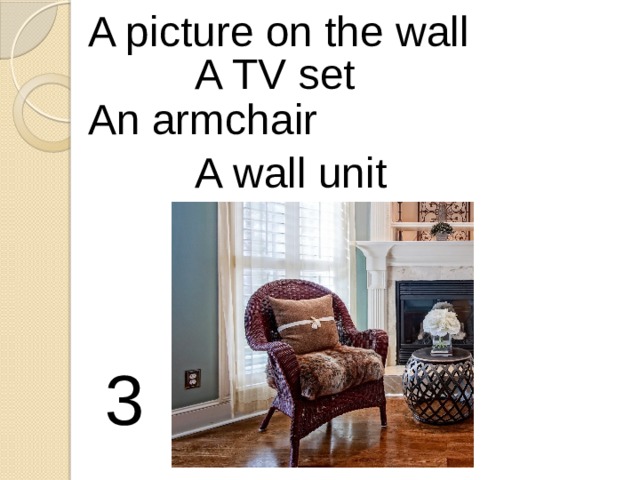 A picture on the wall A TV set An armchair A wall unit 3 