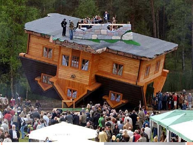 Upside Down House .Completed in 2007, .Designed by Polish businessman and philanthropist Daniel Czapiewski, .Situated in the village of Syzmbark 