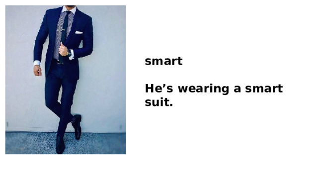 smart  He’s wearing a smart suit. 